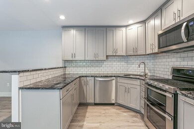 3535 Chevy Chase Lake Dr unit 104, Chevy Chase, MD 20815 - photo 5