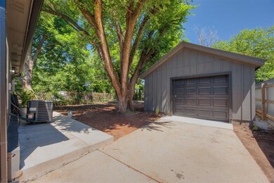 Garage featuring central AC unit