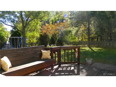 The back deck and large private yard are perfect f