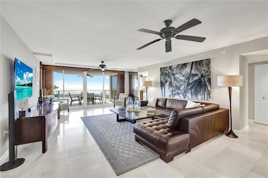 Living area featuring light tile patterned floors,