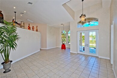 Vaulted Volume Entrance into Formal Living Room is Stunning