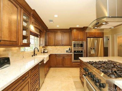 Custom kitchen with farmhouse sink, thermador cook