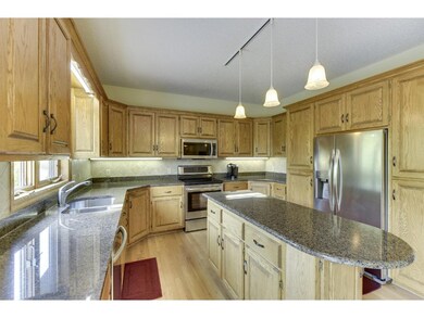 Delightfully updated kitchen features: hardwood fl