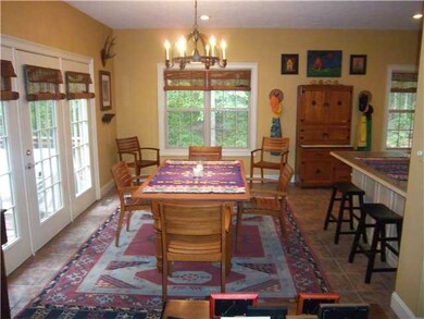Dining area, table seats six comfortably.