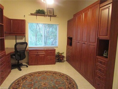 DEN WITH BUILT IN OFFICE AND MURPHY BED