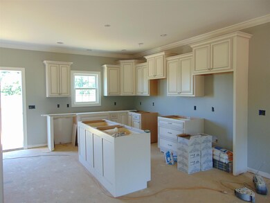 Beautiful open kitchen with island! Can you imagine yourself cooking in this gourmet kitchen??