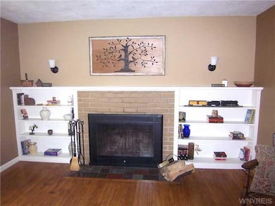 Living Room. THE WOODBURNING FIREPLACE.