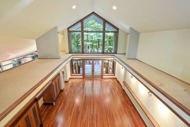 view of living room from upper level office