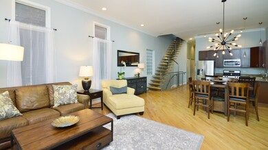 Staircase leads up to private rooftop deck.