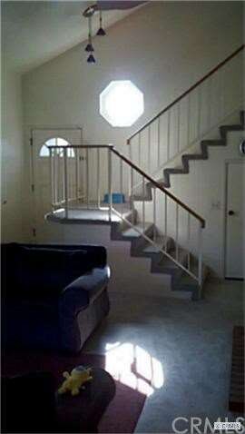 Staircase to upstairs bedrooms.