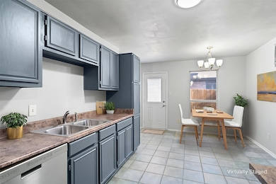The eat-in kitchen features a breakfast nook that overlooks the patio.