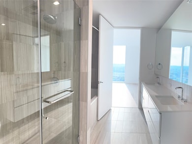 Full bathroom featuring plenty of natural light, 