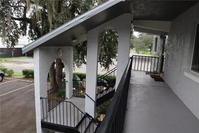 Front of the home with stairs near by.