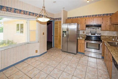 Huge eat-in kitchen and beautiful bay window.