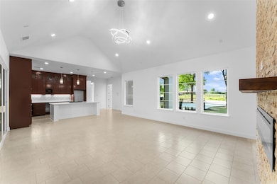 Unfurnished living room featuring recessed lightin