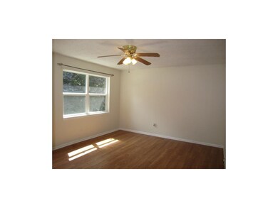 Another view of living room and front window. Newe