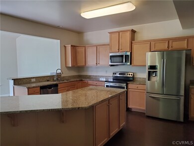 Kitchen with Island with seating for 4.  All appliances as seen convey!