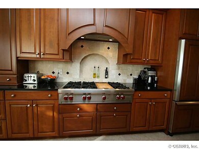 Kitchen custom cherry kitchen, 6 burner Wolf cookt