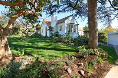 Professionally landscaped grounds offer expansive 