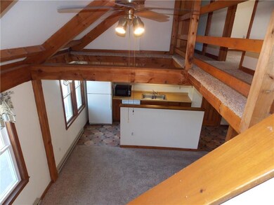 View from the stairs of the kitchen area