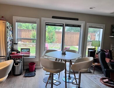 Dining room with light wood-type flooring