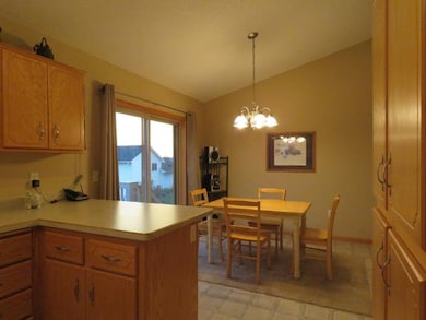 The vaulted ceiling on the main level adds to the 