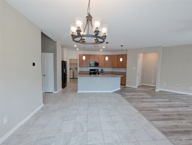 Dining area has tile flooring easy to maintain, an