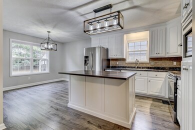 This updated kitchen is very functional and perfect for entertaining!