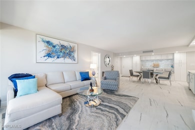 Living room with light tile patterned floors