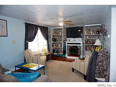 Living Room. The large window offers plenty of nat