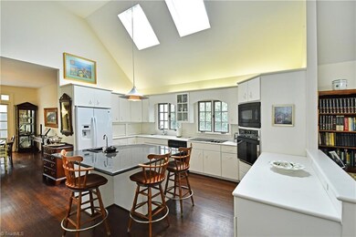 Sunny kitchen with seating at island