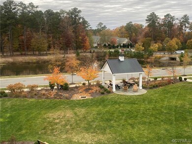 View of yard with a gazebo and a water view