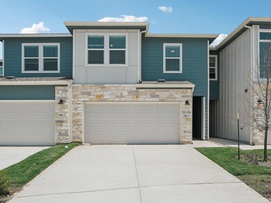 Multi unit property with stone siding, an attache