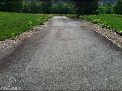Exterior Front. Driveway into home