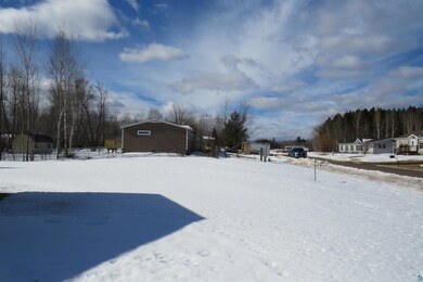 View of yard layered in snow