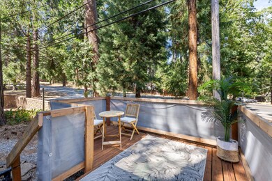 Expanded deck overlooking the pines