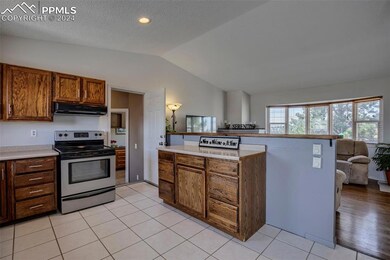 Kitchen opens to Living Room!