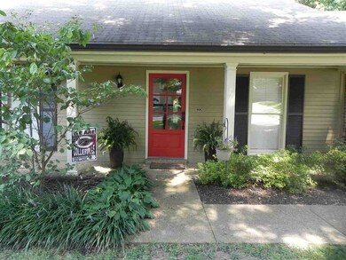 Updated door with new paint and gutters-fully land