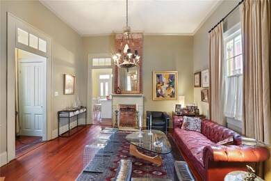 Living room with fireplace/mantle and refinished h