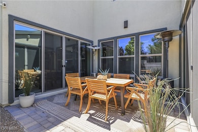 Side Patio w/ entrance from Den or Living Room