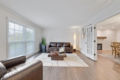 Living Room, New Hardwood Floors, French Doors leading to Dining Room.