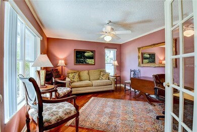 French Doors off the foyer enclose the den/study~