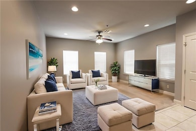Living room is virtually staged.