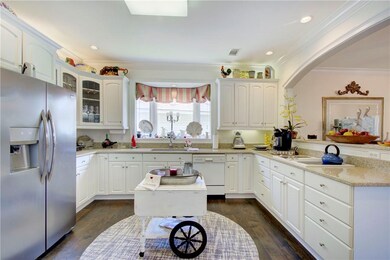 large kitchen opens to dining room.