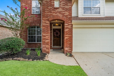 Handsome brick exterior and covered porch for gree