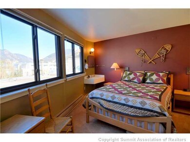 Bedroom. Lofted bedroom has beautiful mountain vie