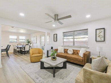 Living room featuring light hardwood / wood-style 