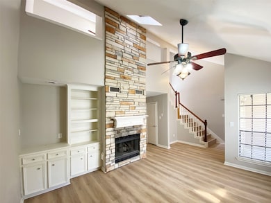 Living room with built-ins and tons of daylight