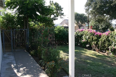 Side gate access to back yard.