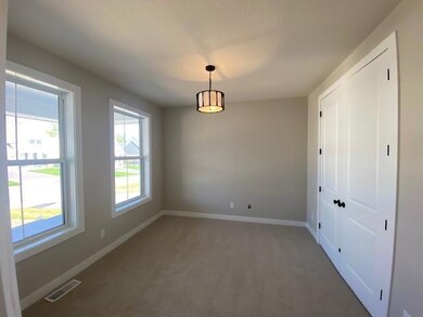 Front flex room with privacy pocket doors, use as office, sitting room, or bedroom or guest bedroom.